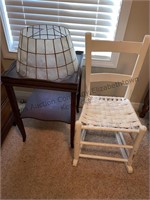 String bottom racking chair, end table and lamp