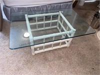 Wood base heavy glass top table. 46x30x1/2 inch