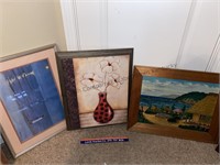 3 framed pieces of artwork.