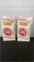 2 Lucky Strike cigarettes Poster board