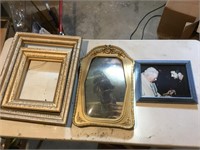 Framed pictures and two empty frames - boat