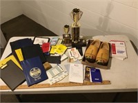 Wooden shoes, trophies, note pads of every size