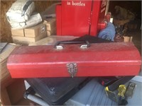 Metal tool box filled with tools