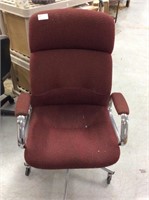 Red rolling desk chair with arms