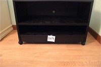 Black Wooden Stand on Casters