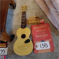 Ukulele, book and accessories