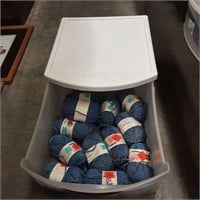 12 skiens yarn in plastic storage drawer