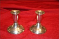 PAIR OF STERLING SILVER WEIGHTED CANDLE HOLDERS