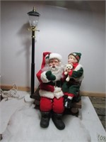Santa with child and lamp