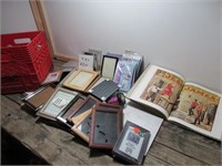 Assortment of picture frams and book