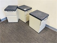 Three  File Cabinets with Cushioned Top