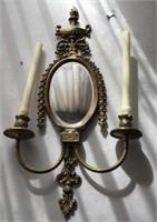 Heavy brass mirrored candle sconce