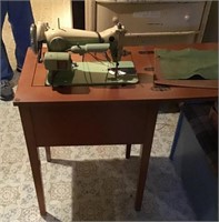 Vintage Riccar sewing machine and cabinet