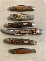 Six pocket knives. Fish knife and the little