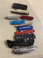 12 miscellaneous pocket knives