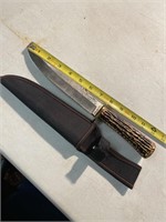 Hunting knife with simulated stag handle. 12