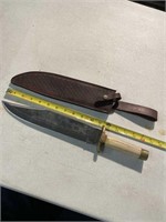 Timber Rattler Bowie knife with leather sheath.