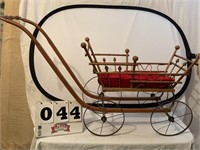 Wooden doll stroller with metal wheels. 36 inches