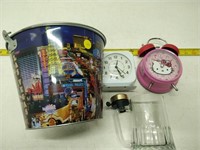 pail, beer glass and clocks