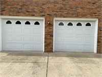 Set of 2 nice garage doors with openers.