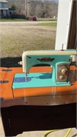 Home Mark Deluxe sewing machine built in stand