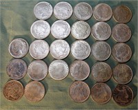 27 replica silver dollar coins each weighing about