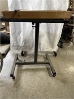 Adjustable height rolling table & wood