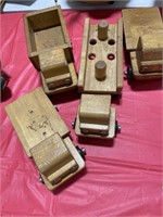 4 wooden trucks