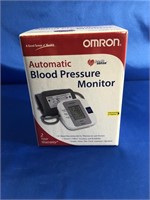 BLOOD PRESSURE MONITOR FROM OMRON. IN ORIGINAL BOX