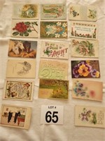 17 antique postcards.  Some with stamps