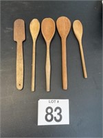 2 wooden spoons/paddles