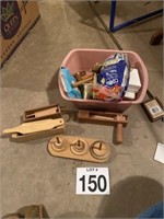 Box of wooden toys and 2 turkey calls