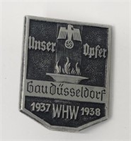 German WWII 1937 WHW 1938 Unser Opfer Tinnie Badge