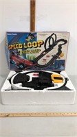 Vintage Speed Loop slot car race track.  Looks to