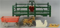 A TREE STAND A HORSE DRAWN WAGON & A WOOD SLED