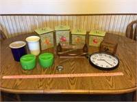 Metal canisters, recipe box, bread basket, clock
