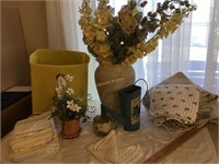 Vase with flowers, pillow ceases, bedding
