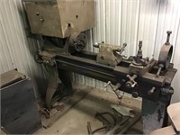 Metal lathe 18 inch bed with a 14 inch swing.