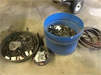 Miscellaneous buckets of bolts and hose