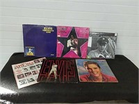 Vintage Elvis Presley LP record lot and calendar.