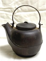 Small antique cast iron tea kettle