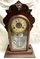 Antique mantle clock has key 18” tall