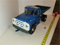 Toy Dump Truck older steel toy,has info paper,