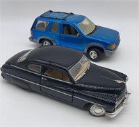 Die-cast Ford Explorer and 1949 Mercury