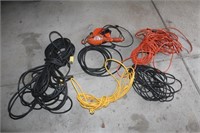 5 EXTENSION CORDS AND ONE WORK LIGHT