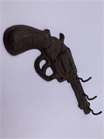 Cast iron wall mounted key hanger in the shape of