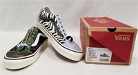 pair of vans canvas sneakers camo and zebra stripe