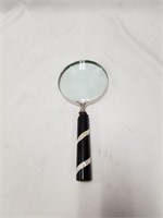 9 1/4" magnifying glass         (P 22)