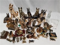 Large box lot of dog figurines         (P 22)