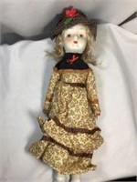 Porcelain Doll in Vintage Clothes